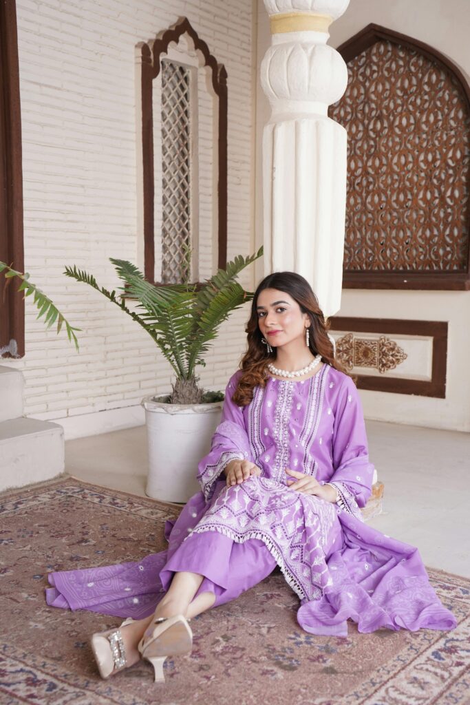 Stunning portrait of a woman in traditional Pakistani attire, indoors in Lahore.